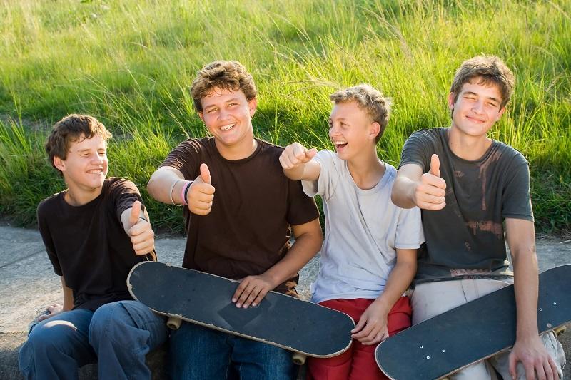 Group of boys giving thumbs up