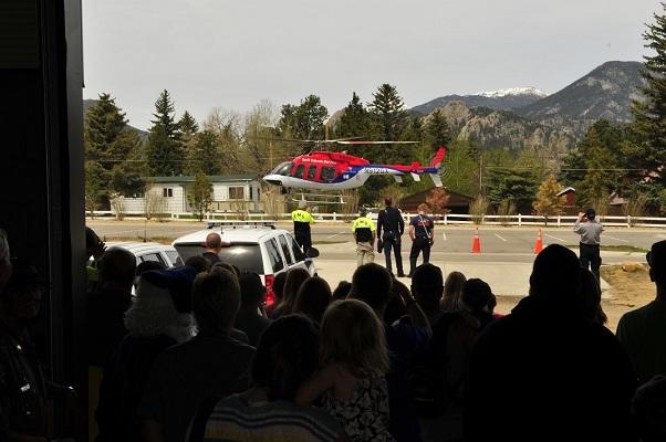 Helicopter landing in front of crowd at Safety Fair